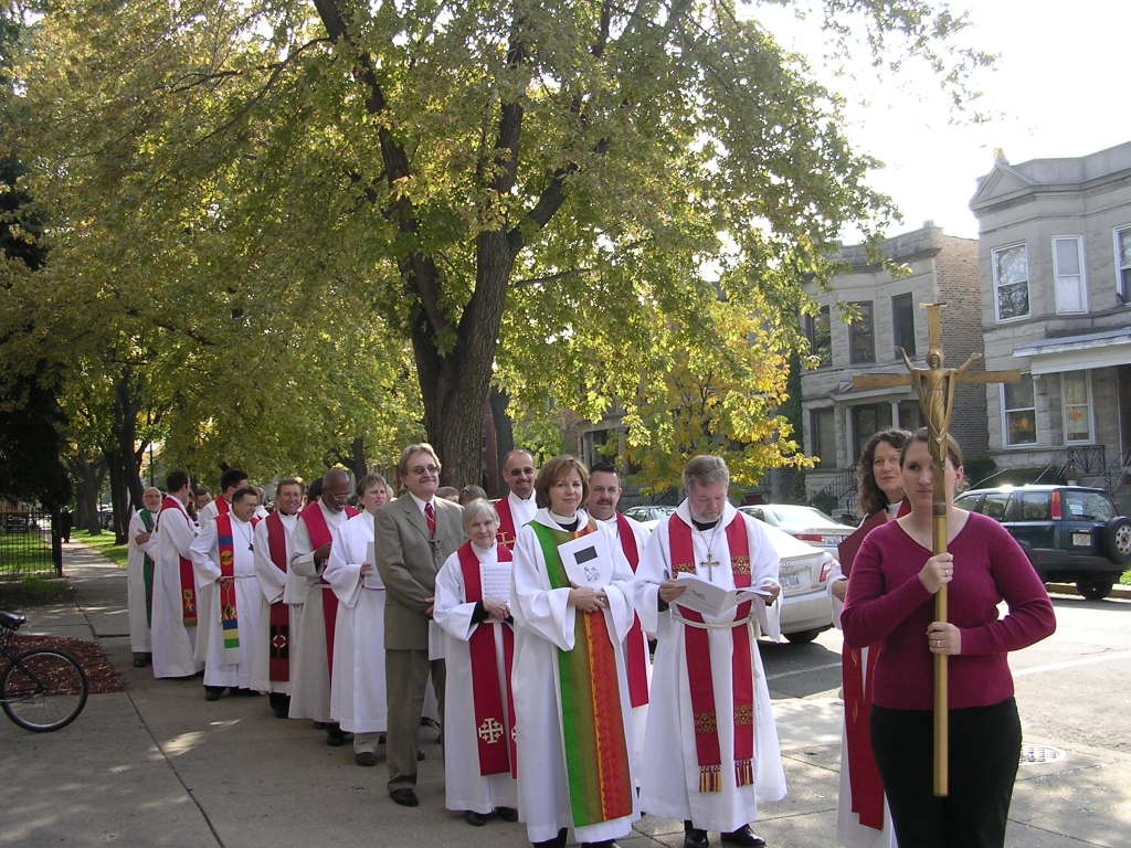 Goddaughter Katie (far right) carries the cross at my ordination, ca. October, 2006.