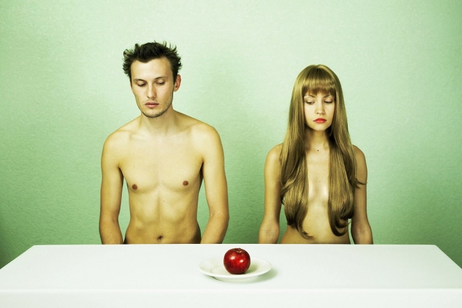 Two nude lovers with apple